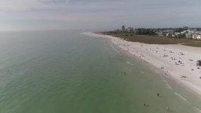 Aerial views of Siesta Beach near Sarasota, Florida - in Feb - raw footage - no coloring
