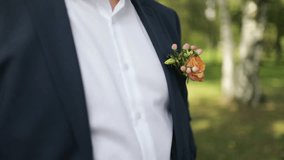 boutonniere, groom in a jacket. Close-up