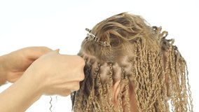 Traditional African hairstyles on white women. professional hairdresser weaves plaits