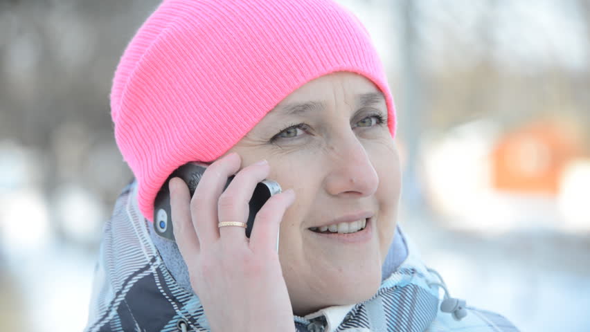 girl phone business winter, girl winter on the street talking on the phone, business talks