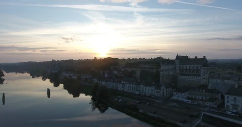Aerial drone view of a very Nice sunrise at Amboise the Castle, next to the river Loire in France