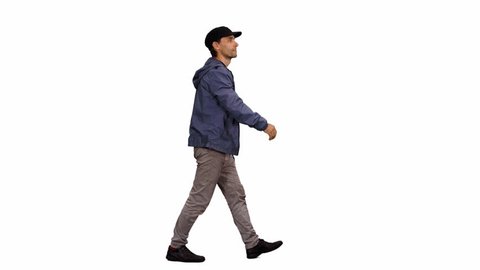 Side view walking man in blue jacket and black peaked cap, Full HD footage with alpha channel