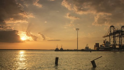 Beautiful panning to right time lapse during sunset at famous port klang.