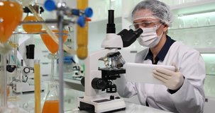 Chemistry Lab, Scientist Woman Working Studying Microscope Medical Research 4K
