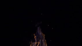 Top of burning fire with blue smoke at night on black background, 8x 240 fps slow motion, full hd 1080p video clip