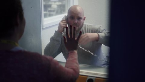 Prison Visit, Phone Booth Between Wife / Girlfriend And Inmate Modern Prison 4K.