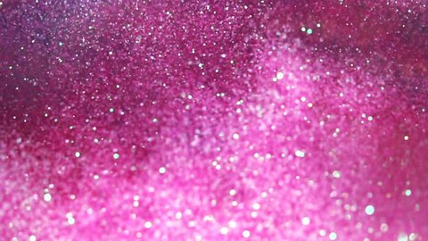 Pink glitter / dust / powder / sparkle ground surface explosion shot in slow motion at 960fps