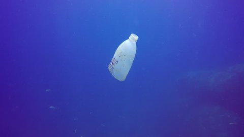 KHAO LAK, THAILAND - 25 FEBRUARY 2018: Plastic bottles and bags pollution in the ocean.