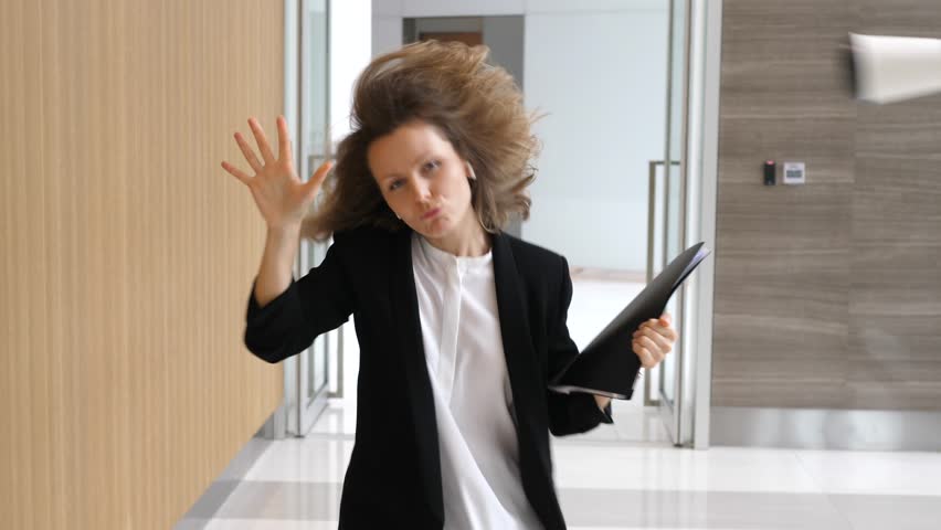 Business Woman Dancing In Office Hall Wearing Wireless Earphones | Shutterstock HD Video #1007929123