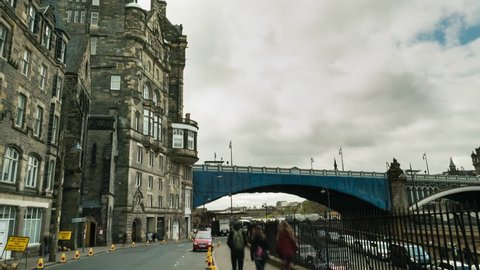 Timelapse - People and cars on street near Waverly Station in Edinburgh, Scotland
