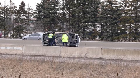 Toronto, Ontario, Canada February 2018 Police and emergency vehicles at accident and crash scene on highway