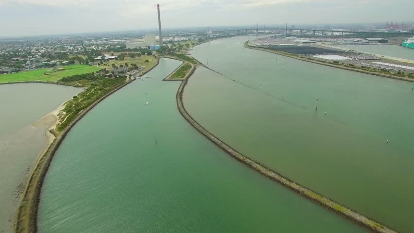 Forward flight over Yarra River mouth towards Newport Power Station in Melbourne, Australia
