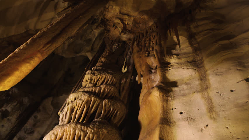Stalactites hanging from ceiling in Australian cave complex - HD 25P. 
