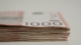 Many denominations of 1000 dinars close-up  