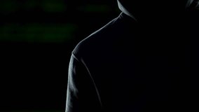 Thief breaks safe, selecting suitable password through application on smartphone - Powered by Shutterstock - Get 15% off with code: PIKWIZARD15