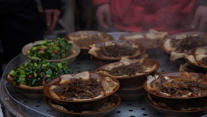 traditional Sichuan food , steam streaky pork with vegetables 