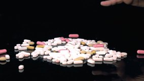 High quality video of grabbing pills in real 1080p slow motion 250fps