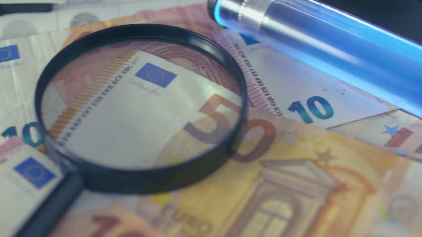 Counterfeit money expertise EUR UV 4K Royalty-Free Stock Footage #1007992504