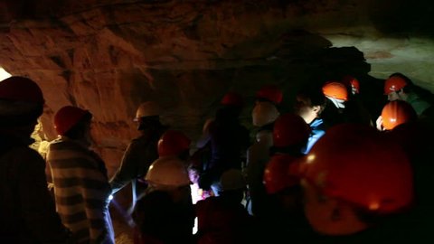 SABLINO, RUSSIA-CIRCA JUN, 2017: People visit underground Chapel of Saint Nicholas the Wonderworker in Sablin Caves. Sablinsky caves are in Tosno district, Leningrad region