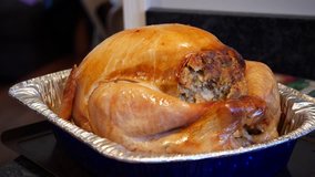 Roasted chicken or turkey in a foil container