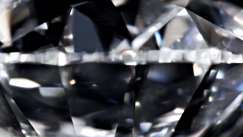 Diamond with GIA number . Diamond with real dispersion on a black background, extreme close up. Royalty-Free Stock Footage #1008019192