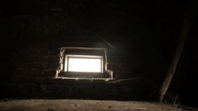 Light from the window on old attic slow motion 1080p FullHD footage - Spooky scene on abandoned loft slow-mo 1920X1080 HD video