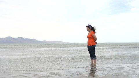Female standing in the Great Salt Lake