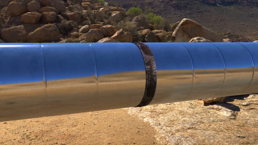 Long oil/gas pipeline in desert Royalty-Free Stock Footage #1008044050