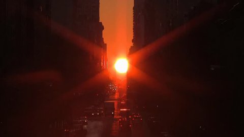 Manhattanhenge, 2nd of 2, x5 timelapse ver. Sunrise at 23rd street,  Manhattan, NYC. Rare phenomenon twice a year if sky is clear.