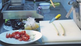 Video Chef cooking healthy salad mussel, dish, cooking, salad with vegetables, ingredients. Recipe food footage fast