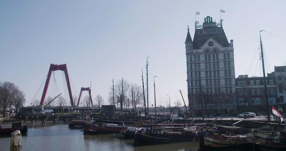 Rotterdam old building with small old harbor in front of a bridge  | Shutterstock HD Video #1008060514