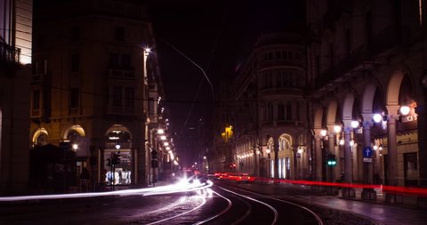 TURIN, PIEMONTE, ITALY, 2018: long exposure at night in via Pietro Micca, timelapse, 4K