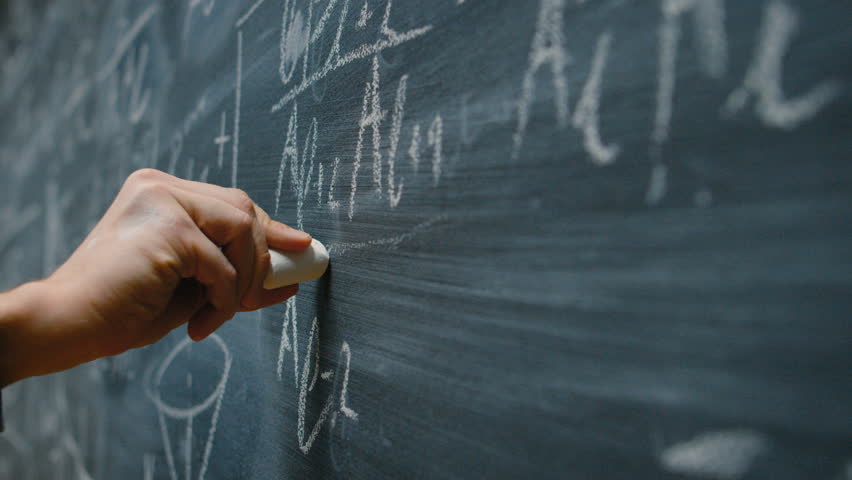 Hand Holding Chalk and Writing Complex and Sophisticated Mathematical Formula Equation on the Blackboard. Shot on RED EPIC-W 8K Helium Cinema Camera. Royalty-Free Stock Footage #1008065782