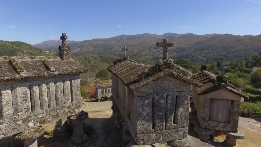 Typical corn stone driers granaries Espigueiros in Soajo village Portugal 4k