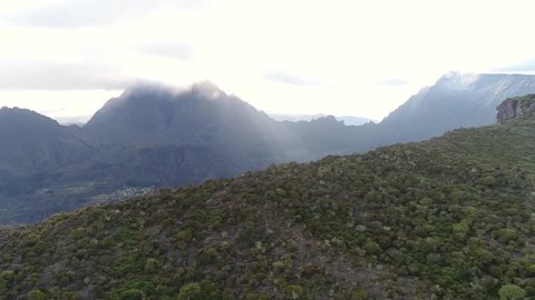 Reunion island aerial drone shot. Footage of the amazing Cirque of Mafate, one of the 3 cirques well known for their spectacular trek and walks / Le Cirque de Mafate vu du ciel. La Reunion par drone.