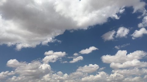puffy cloud oxygen moving Time lapse of white clouds with Puffy fluffy blue sky in background art Cumulus clouds form against brilliant blue sky Blue sky and Seamless clouds Time lapse nature rolling 