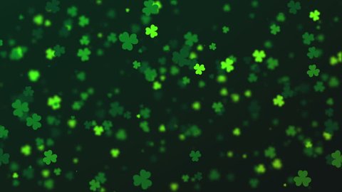 Saint Patrick's Day background. Abstract loopable falling clover leaves made of hearts over dark green background