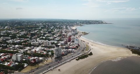 Aerial - Flying over beach and city coast in Montevideo - Uruguay