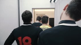 Soccer players in the locker room. Clip. Football team in the locker room. Team is preparing for a football match in the locker room - Powered by Shutterstock - Get 15% off with code: PIKWIZARD15