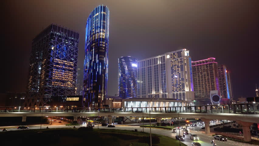Colorful night view of Macau. Roundabout traffic at night. Macau is a popular tourist attraction of Asia and leading casino market of the world.