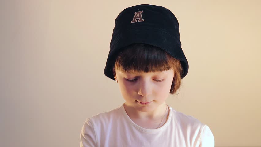 girl plays with tangerines. small girl with mandarins. 