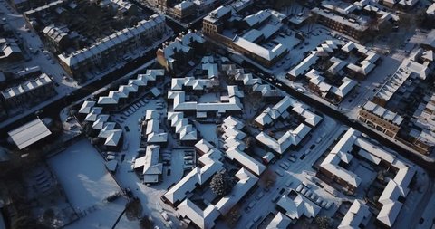 Sweeping drone footage of residential buildings in South West London, England, after a rare snowstorm in March, 2018.