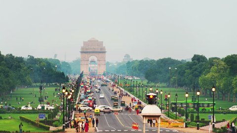 Delhi, India. Time-lapse of Car and people traffic to the India Gate in Delhi in the evening