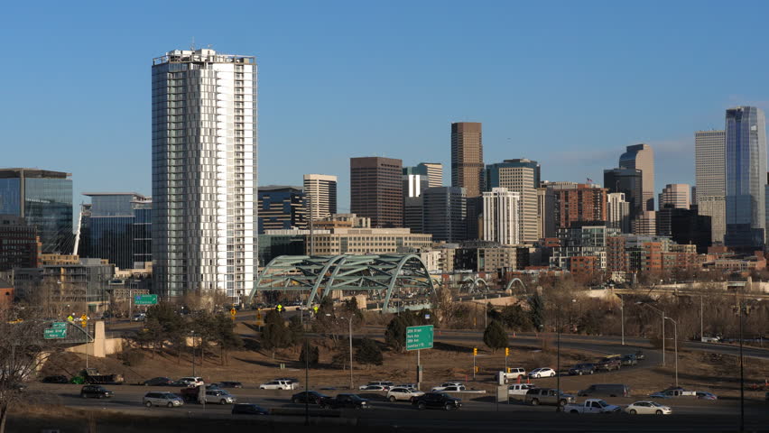 Denver Skyline with Evening Highway Traffic