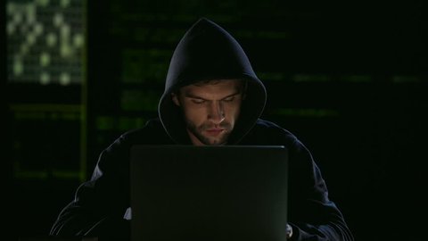 Cybercriminal is happy and satisfied with his success in hacking site protection