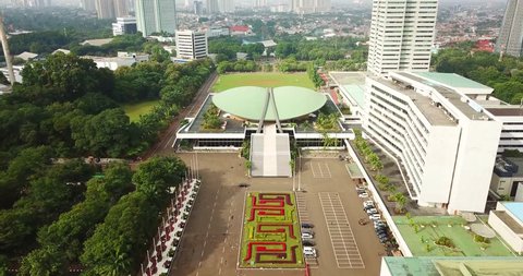 JAKARTA - Indonesia. February 28, 2018: Beautiful aerial view of DPR/MPR Building from a drone flying forward in Jakarta. Shot in 4k resolution
