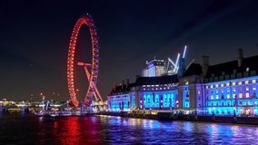 4K Timelapse with zoom: The London Eye - a giant wheel on the Thames River in London, also known as the Millennium Wheel