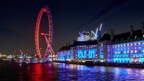 4K Timelapse with zoom: The London Eye - a giant wheel on the Thames River in London, also known as the Millennium Wheel