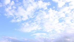 White Clouds & Blue Sky, Flight over clouds, loop-able, cloudscape, day, Time lapse clip of white fluffy clouds over blue sky, Towering Cumulus Cloud Billows, 3840x2160, 30FPS, UHD.