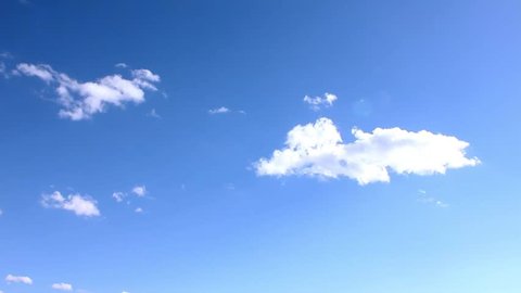 Time lapse white clouds, blue clean summer, sunny lightness sky, fast motion big mass moving in horizon. 3840x2160, 30FPS, UHD.